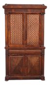 Ω A Regency rosewood secretaire cabinet bookcase , circa 1815, in the manner of George Bullock, the