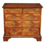 A George I walnut and featherbanded chest of drawers , circa 1720, bookmatched veneers throughout,