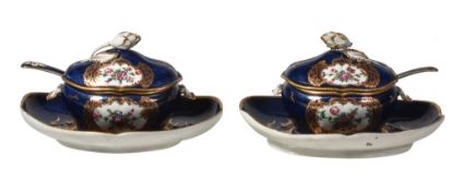 A pair of Worcester blue-ground sauce tureens, covers, ladles and stands, circa 1770, painted with