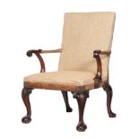 A George II walnut armchair, circa 1740, the rectangular padded back and seat flanked by a pair of