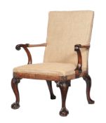 A George II walnut armchair, circa 1740, the rectangular padded back and seat flanked by a pair of