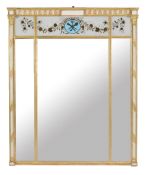 A Regency parcel gilt, cream painted and verre englomise wall mirror, circa 1815, the lapper