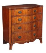 A George III mahogany serpentine fronted chest of drawers, circa 1790, the shaped top above four