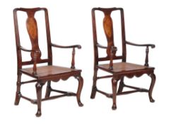 A pair of George II Irish walnut and marquetry armchairs, circa 1735, each shaped rectangular back