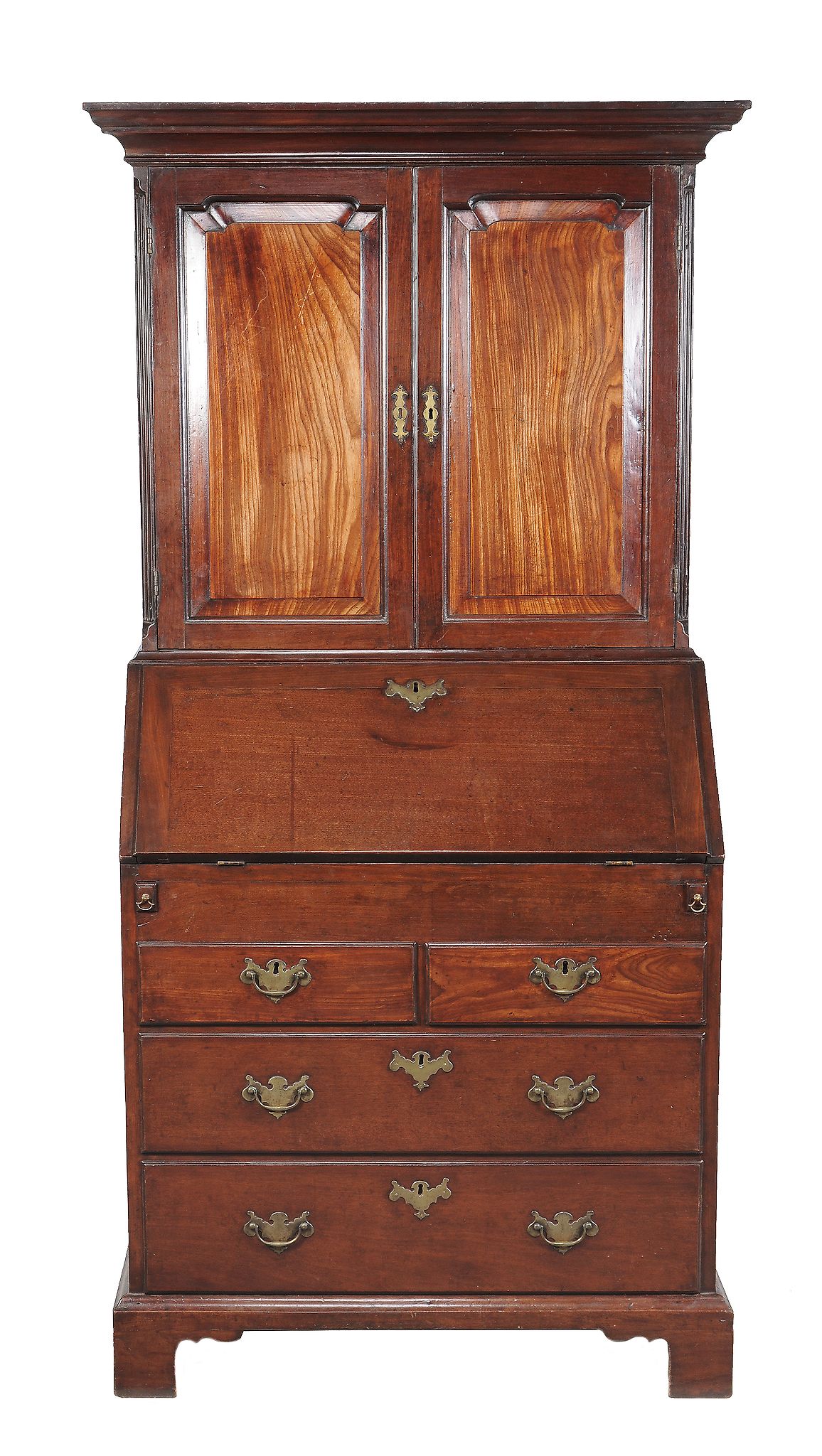 A George II mahogany bureau cabinet, circa 1750, the moulded cornice above a pair of panelled doors