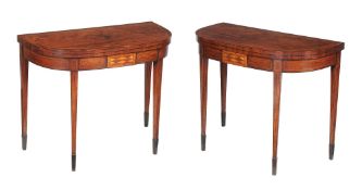 A pair of George III mahogany and parquetry decorated card tables, circa 1790, of D shaped form,