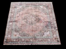 A Tabriz silk carpet , finely decorated throughout with floral branches and foliage, with the