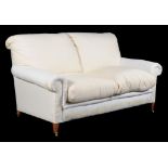 An upholstered two seat sofa in Victorian style by HOWARD CHAIRS LTD, , last quarter 20th century,