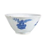 A Bow chinoiserie blue and white conical bowl, circa 1752-55, painted with daoist symbols, painted