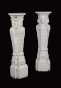 A pair of white painted carved wood pedestals, in George II style, 19th century, in the manner of