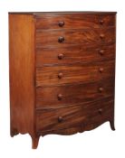 A pair of Regency mahogany bowfront chest of drawers, circa 1815, each top with a reed moulded