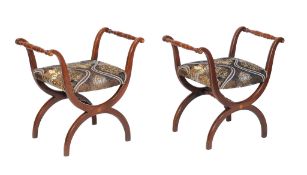 A pair of mahogany and marquetry x framed stools , first quarter 19th century, each overstuffed