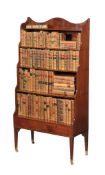 A George III mahogany waterfall bookcase, circa 1790, the shaped three quarter gallery and '