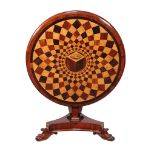 Ω A William IV mahogany centre table, circa 1835, the circular top decorated within elaborate