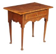 A George I walnut side table, circa 1720, the rectangular top with quarter veneered centre and