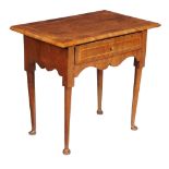 A George I walnut side table, circa 1720, the rectangular top with quarter veneered centre and