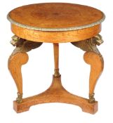 A pair of Continental ash circular occasional tables in Empire style, 19th century, each circular