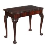 A George II mahogany folding card table, circa 1750, the rectangular top with square outset