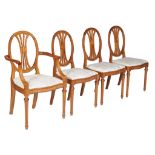 Ω A set of eight solid satinwood and ebony strung dining chairs , 19th century, in the manner of