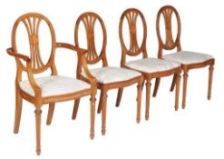 Ω A set of eight solid satinwood and ebony strung dining chairs , 19th century, in the manner of