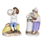 A Russian porcelain model of a harvester, mid 19th century, blue cypher mark, 11cm high; another of