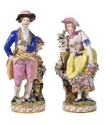 A pair of Minton porcelain models of a gardener and companion, circa 1840, modelled wearing