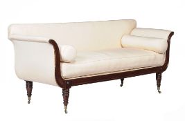 A Regency mahogany and upholstered sofa, circa 1815, the rectangular back above outswept arms with