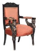 A Continental ebonised armchair, first quarter 19th century, in Empire taste, the rectangular back