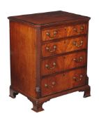 A George III mahogany chest of drawers , circa 1790, the crossbanded rectangular top with moulded