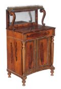 Ω A Regency rosewood and satinwood banded side cabinet, circa 1815, in the manner of Gillows, the
