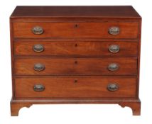 Ω A George III mahogany dressing chest, circa 1790, the rectangular top inlaid with stringing to