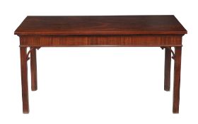 A George III mahogany serving table , circa 1780, the rectangular top above a moulded frieze and