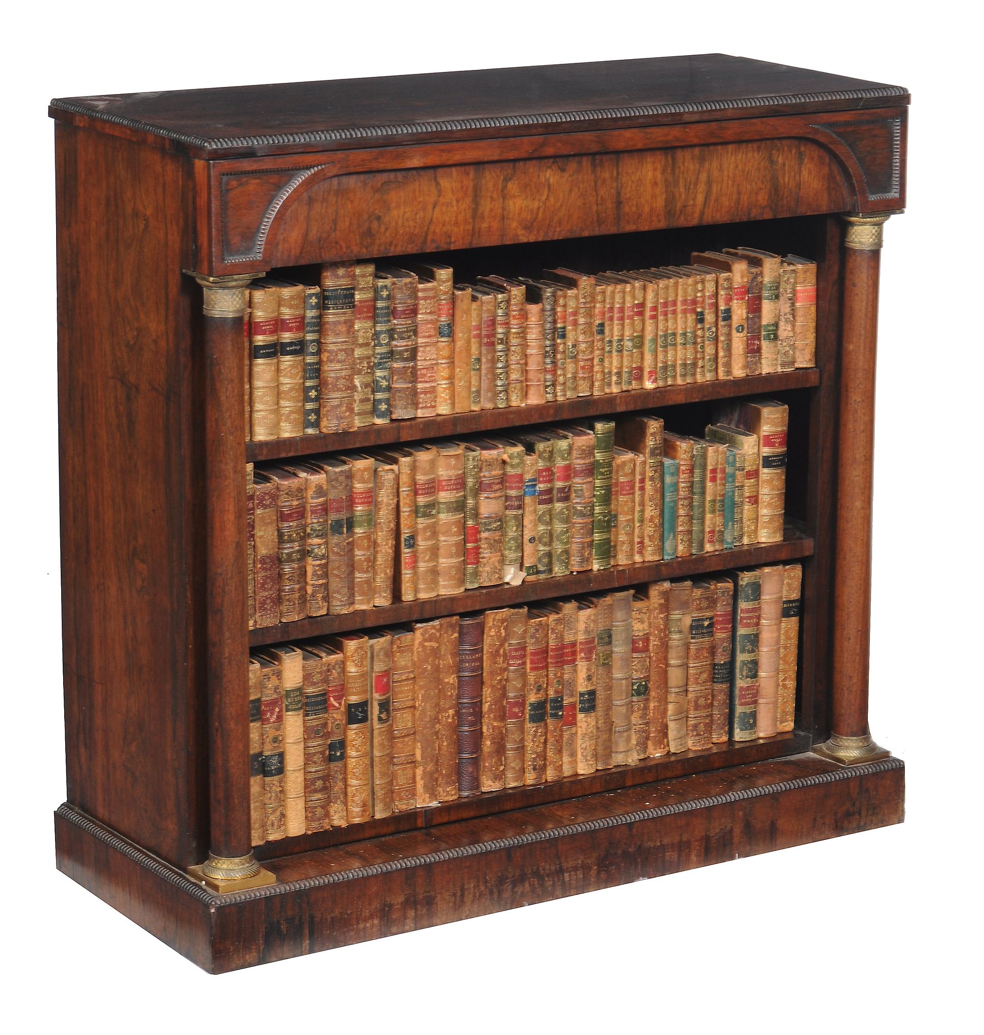 Ω A Regency rosewood open bookcase, in Empire taste , circa 1815, the rectangular top with bead