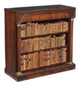Ω A Regency rosewood open bookcase, in Empire taste , circa 1815, the rectangular top with bead