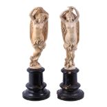 Ω A pair of Dieppe sculpted ivory models of maidens, third quarter 19th century, both portrayed