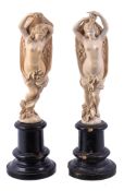 Ω A pair of Dieppe sculpted ivory models of maidens, third quarter 19th century, both portrayed