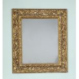 An Italian carved giltwood frame, Bolognese, circa 1600 , the frame carved profusely with fruiting