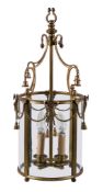 A Continental gilt metal and glazed cylindrical hall lantern, early 20th century, the four bowed