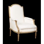 A Louis XVI carved giltwood armchair, circa 1775, the arched and padded rectangular back decorated