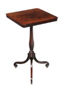 A George III mahogany tripod table , circa 1810, the square top above a wrythen turned baluster
