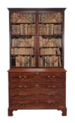 A George III mahogany secretaire bookcase , circa 1780, the moulded cornice incorporating dentil