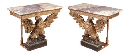 A pair of carved giltwood console tables, circa 1740 and later, each breche violette marble top