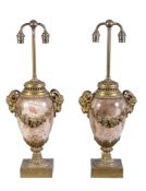 A pair of Continental striated marble and gilt bronze mounted urn table lamps in Louis XVI style,