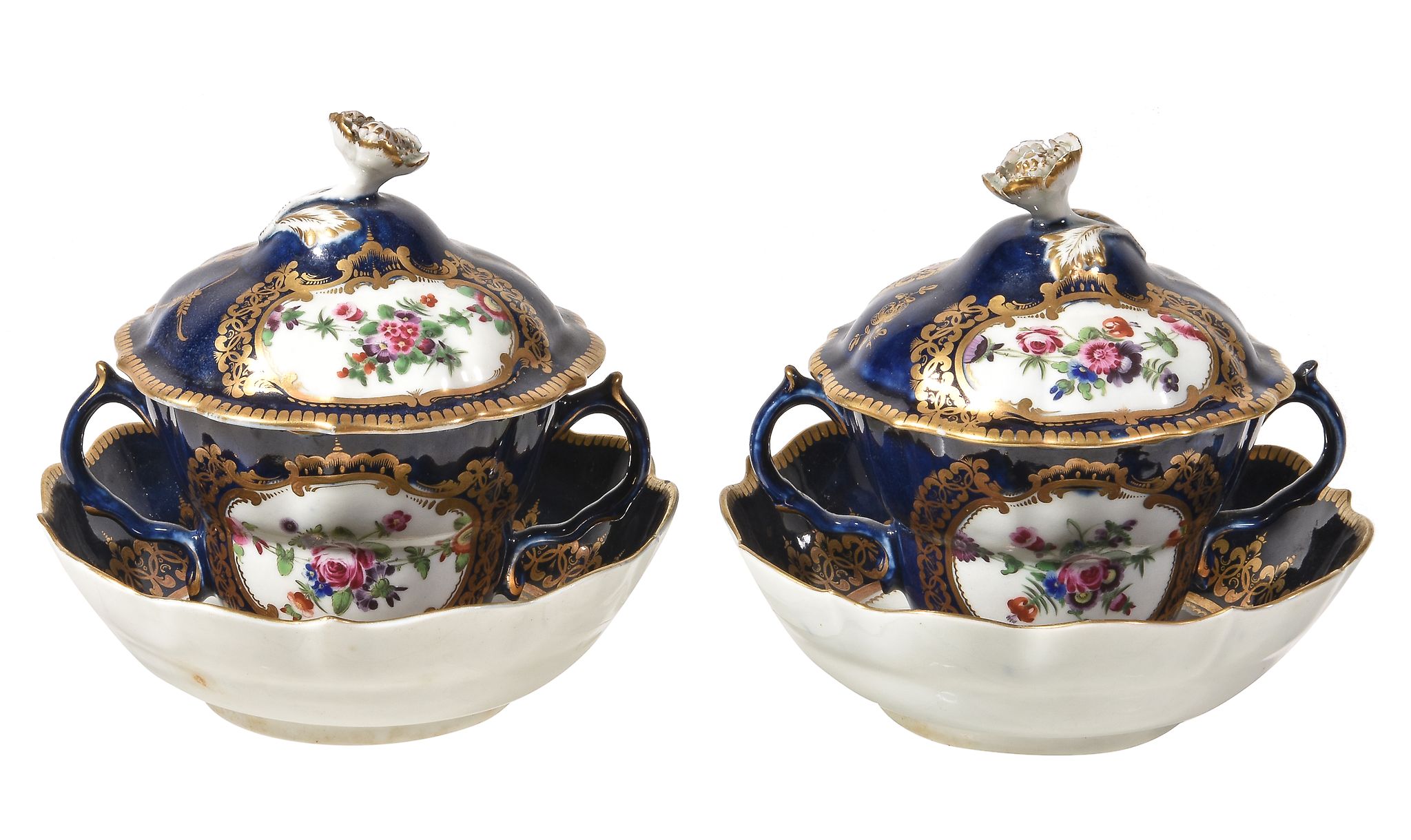 A pair of Worcester blue-ground two-handled chocolate cups, covers and stands, circa 1770, painted