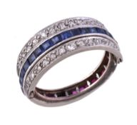 A 1920s diamond, ruby and sapphire night and day eternity ring, the band set with square cut rubies