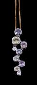A multi coloured sapphire and diamond pendant, the articulated panel set with vari coloured