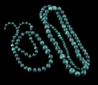 A malachite bead necklace, composed of graduated 4mm to 15mm malachite beads, 88cm long; and a