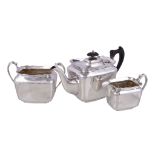 An Edwardian silver rounded rectangular three piece tea service by Lee & Wigfull, Sheffield 1906-
