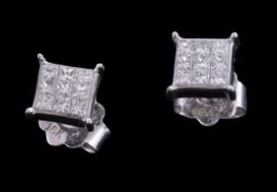 A pair of diamond earrings, set with princess cut diamonds, approximately 0.36 carats total, in