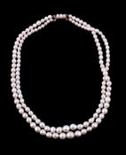 A two row cultured pearl necklace, composed of graduated 4mm to 9mm cultured pearls, to the clasp